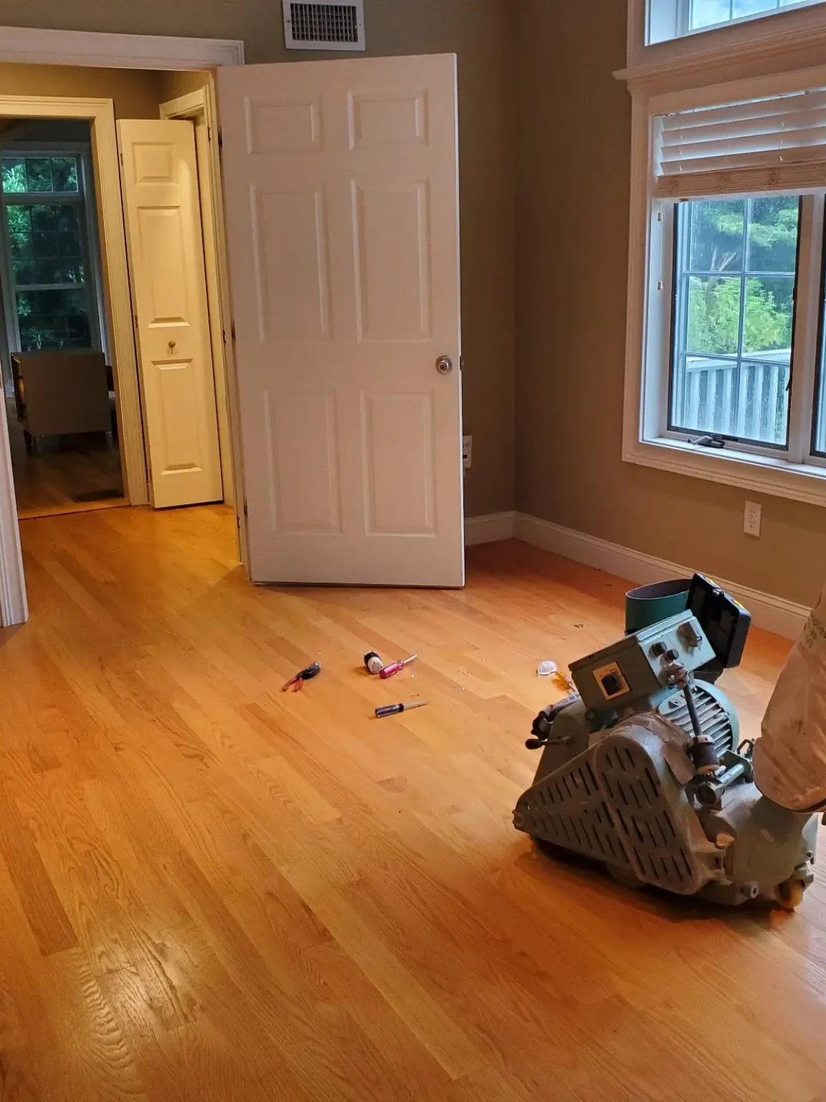 hardwood-floor-refinishing-before.webp
