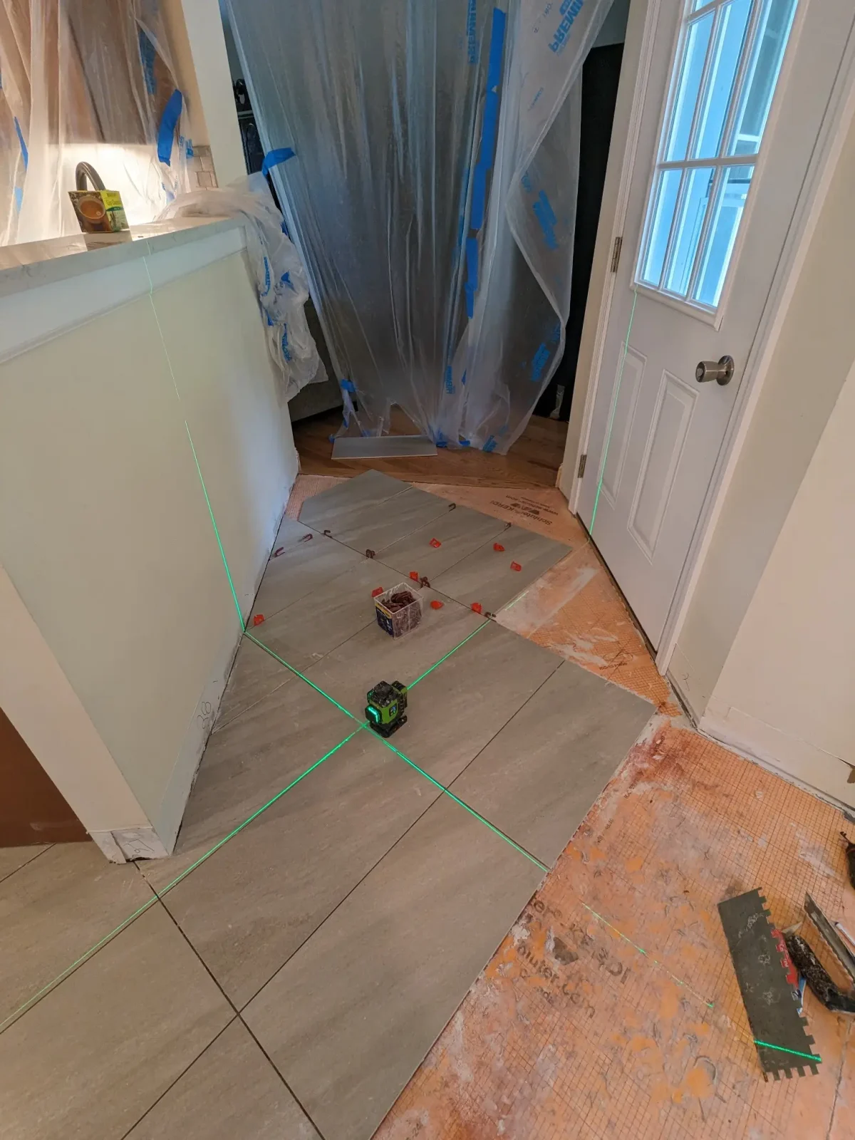 tile-layout-laser-level-installation.webp